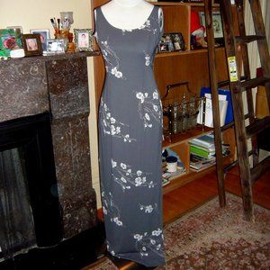 Adrianna Papell beaded floral sleeveless  dress with a slit on the right side